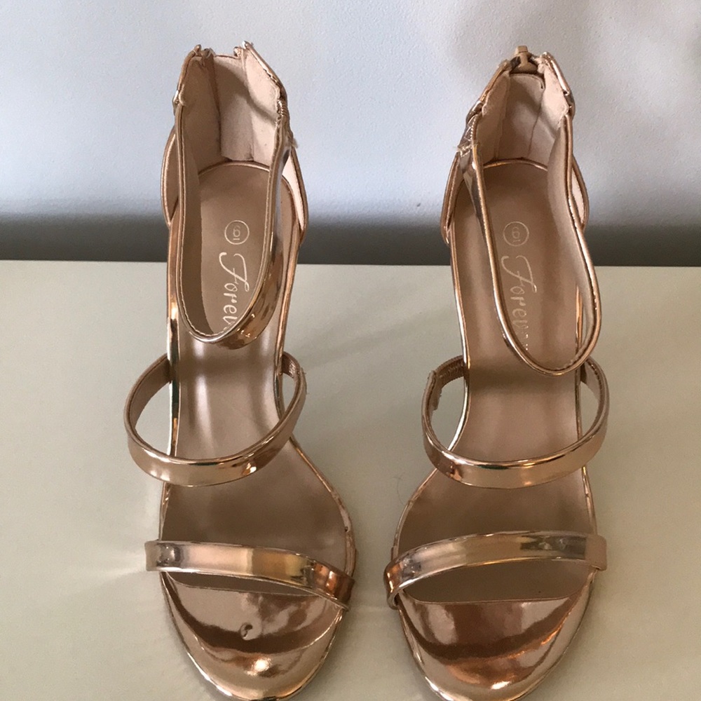 Metallic rose gold strapy heels. NWOT